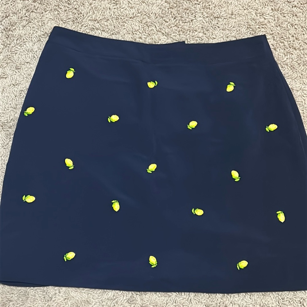 EP Pro Golf Skort navy blue w/ lemon embroidery 1 side and back pocket